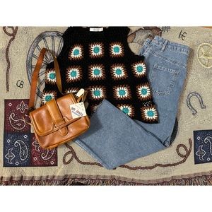 Twik knit top with flower pattern.